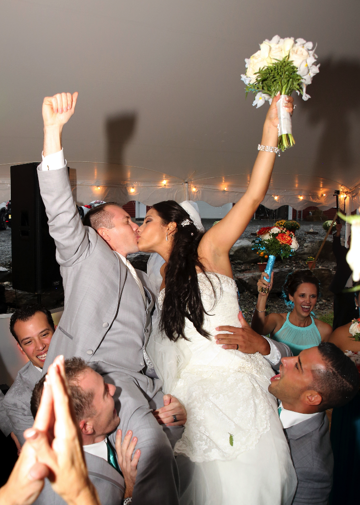 Bride and groom were swept off their feet by guests during their outdoor reception- Schohola, PA