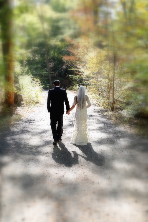Bride and Groom Take a Moment For Special Sunlit Walk As Husband and Wife- Fire and Oak in Montvale, NJ.